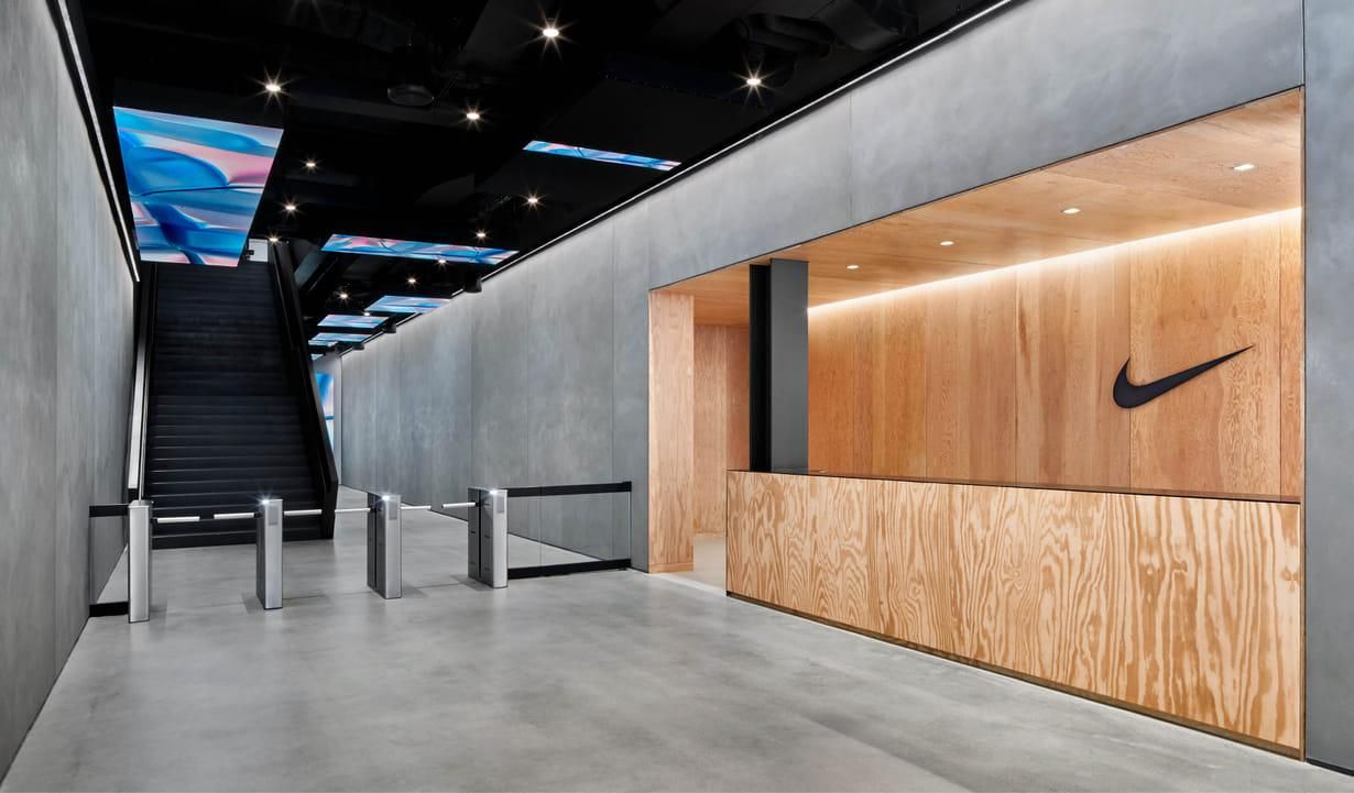 Entry with a timber feature wall and a security gate